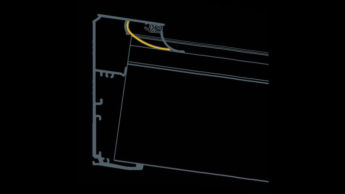 Détail du double joint au raccord de toiture